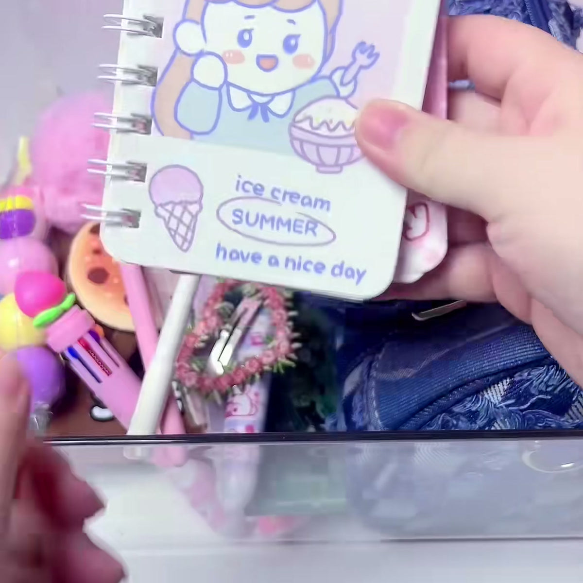 A mini notebook pulled from a scoop