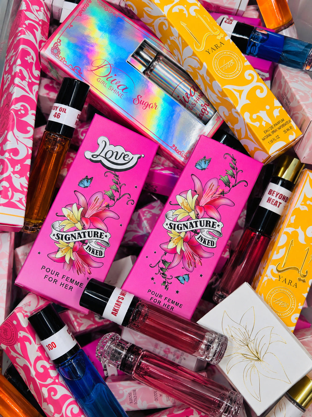 Boxed travel size perfumes in the scent bin