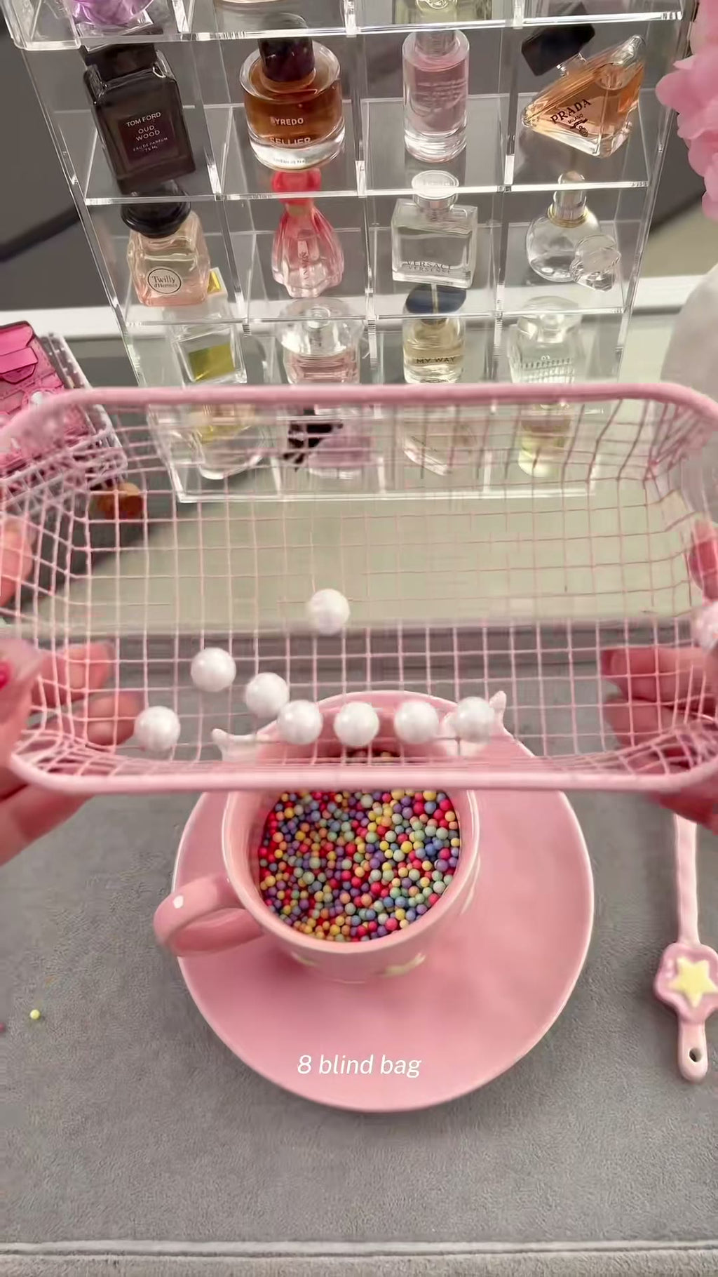 Scooping the scent bin, mini perfumes behind